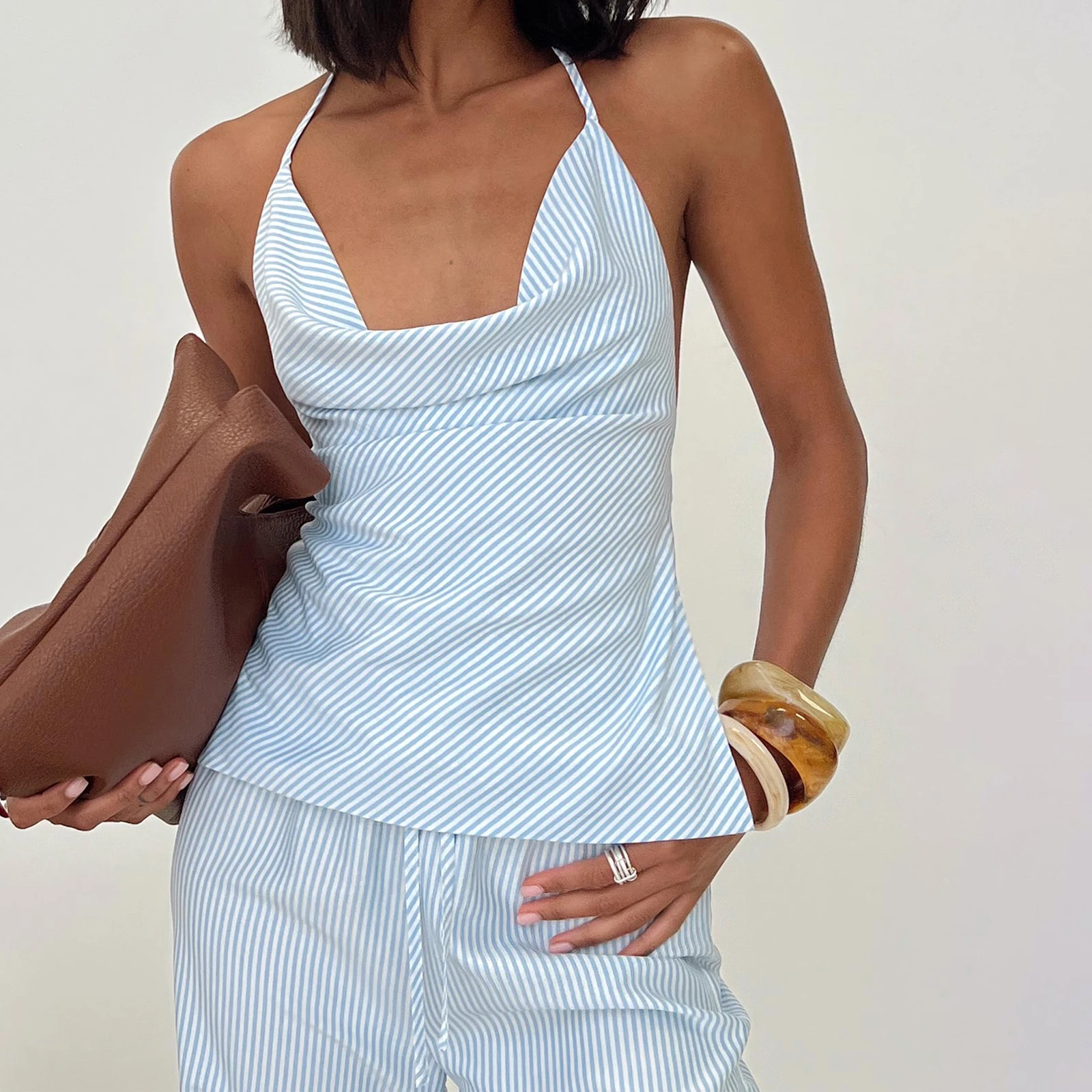 Combhasaki женский комплект из 2 предметов, летний комплект одежды в полоску с принтом, топы без рукавов на шнуровке с лямкой на шее и открытой спиной + свободные широкие длинные брюки
Combhasaki женский комплект из 2 предметов, летний комплект одежды в полоску с принтом, топы без рукавов на шнуровке с лямкой на шее и открытой спиной + свободные широкие длинные брюки