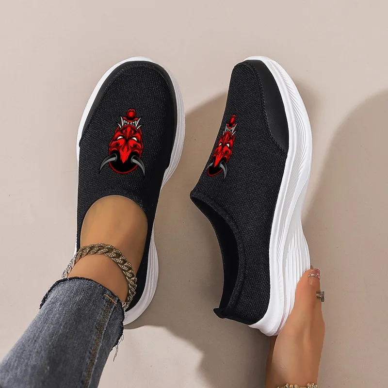 Women's Black Slip-On Platform Casual Shoes: Breathable Mesh with Cartoon Print. Comfortable for Daily Commute & Jeans Matching.
Women's Black Slip-On Platform Casual Shoes: Breathable Mesh with Cartoon Print. Comfortable for Daily Commute & Jeans Matching.