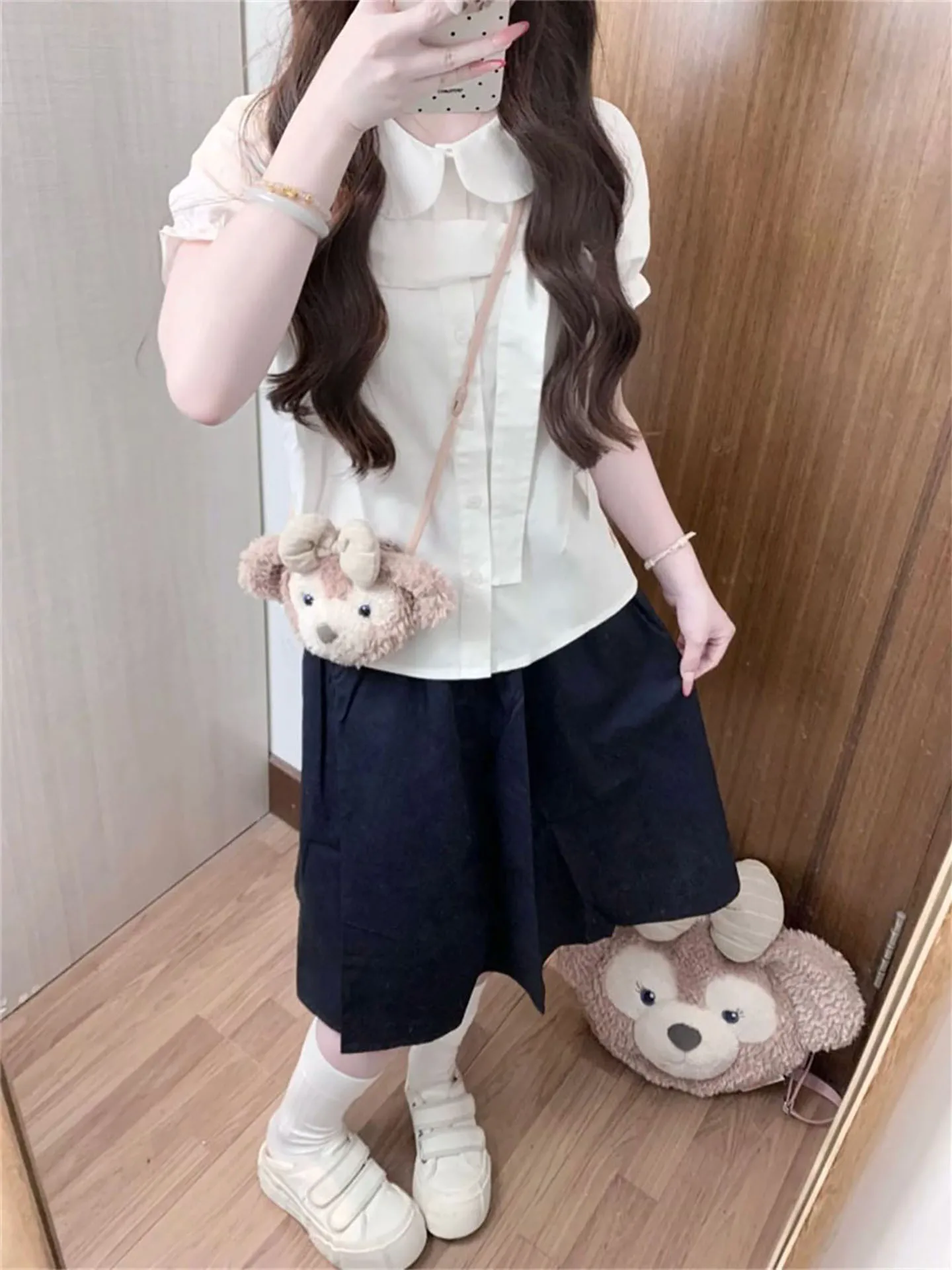 Summer Gentle Knot Girl's White Doll Collar Black Skirt Two-Piece Set Fashionable Casual Wear for Young Women
Summer Gentle Knot Girl's White Doll Collar Black Skirt Two-Piece Set Fashionable Casual Wear for Young Women