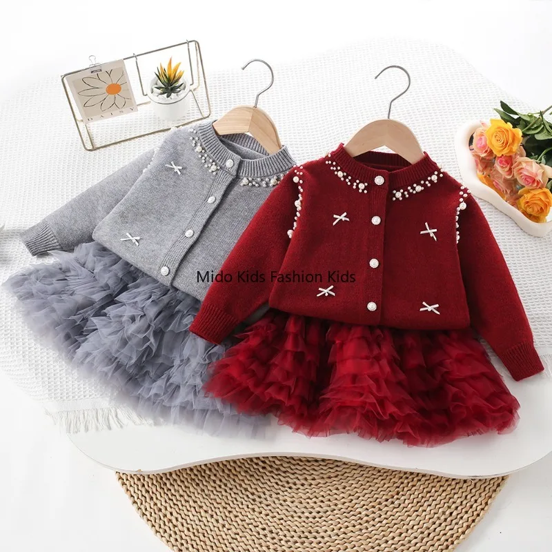 Girls' sweater set for autumn and winter new style baby girl knitted pearl cardigan Korean-style stylish princess net cake dress
Girls' sweater set for autumn and winter new style baby girl knitted pearl cardigan Korean-style stylish princess net cake dress
