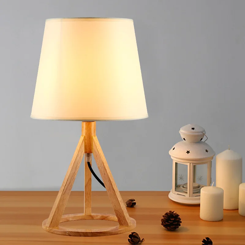 Cross-border simple wood tripod table lamp hotel room bedroom bedside table lamp creative bedroom table lamp
Cross-border simple wood tripod table lamp hotel room bedroom bedside table lamp creative bedroom table lamp