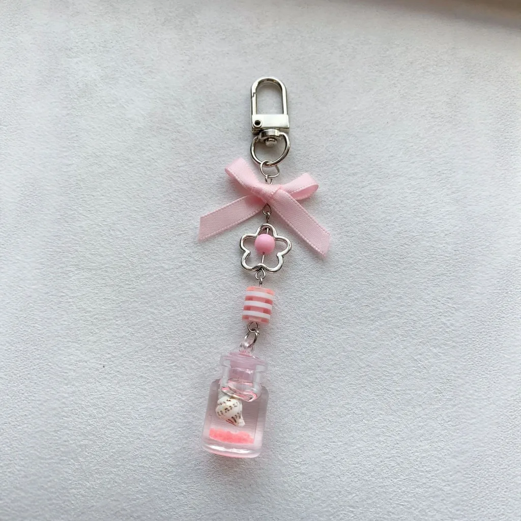 Pink Charm Pendant Bottle Key Chain Bowknot Bag Charm Pink Decorative Key Chain For Travel Luggage Keys Photo
Pink Charm Pendant Bottle Key Chain Bowknot Bag Charm Pink Decorative Key Chain For Travel Luggage Keys Photo