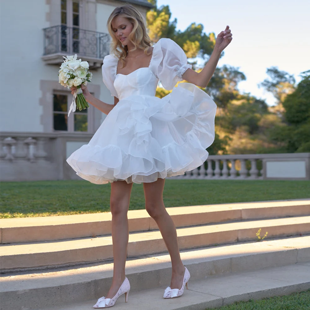 Short Wedding Dress White Organza Puff Sleeves A Line Mini Gown for Women 2023 Bride Ruffle Slit Sweetheart Bridal Gwon
Short Wedding Dress White Organza Puff Sleeves A Line Mini Gown for Women 2023 Bride Ruffle Slit Sweetheart Bridal Gwon
