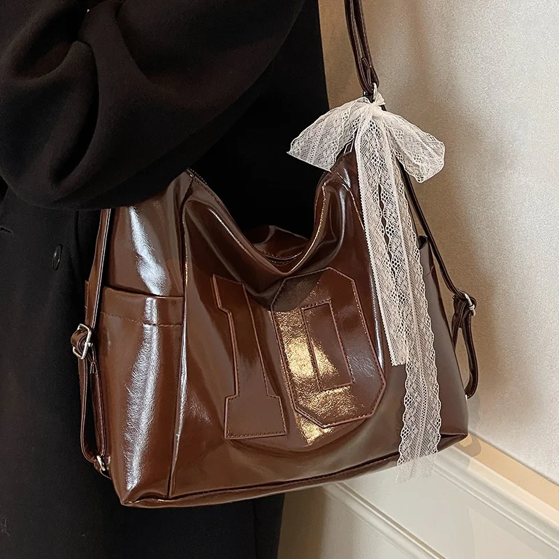 Large Capacity PU Leather Tote Bag For Women Autumn Winter New Fashion Commuter Single Shoulder Bag Leisure Solid Color Backpack
Large Capacity PU Leather Tote Bag For Women Autumn Winter New Fashion Commuter Single Shoulder Bag Leisure Solid Color Backpack