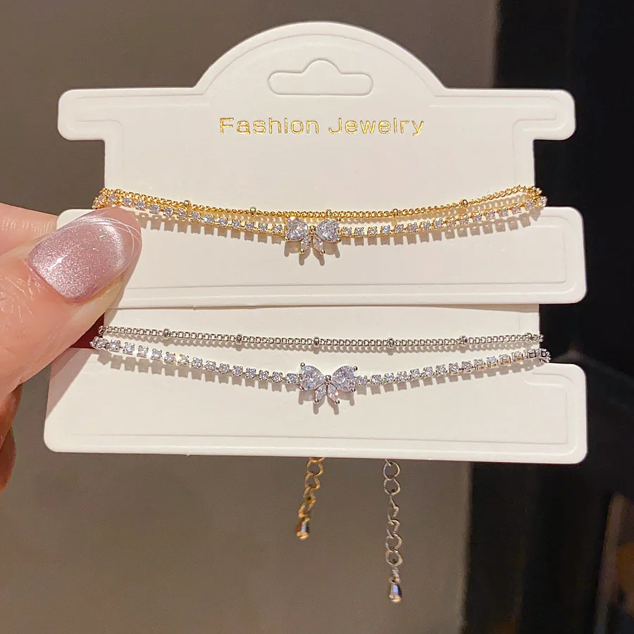 Elegant Zircon Bow Bowknot Silver/14K Real Gold Plated Double Layer Link Chain Bracelet Women Wedding Fashion Jewelry Gifts 1695
Elegant Zircon Bow Bowknot Silver/14K Real Gold Plated Double Layer Link Chain Bracelet Women Wedding Fashion Jewelry Gifts 1695