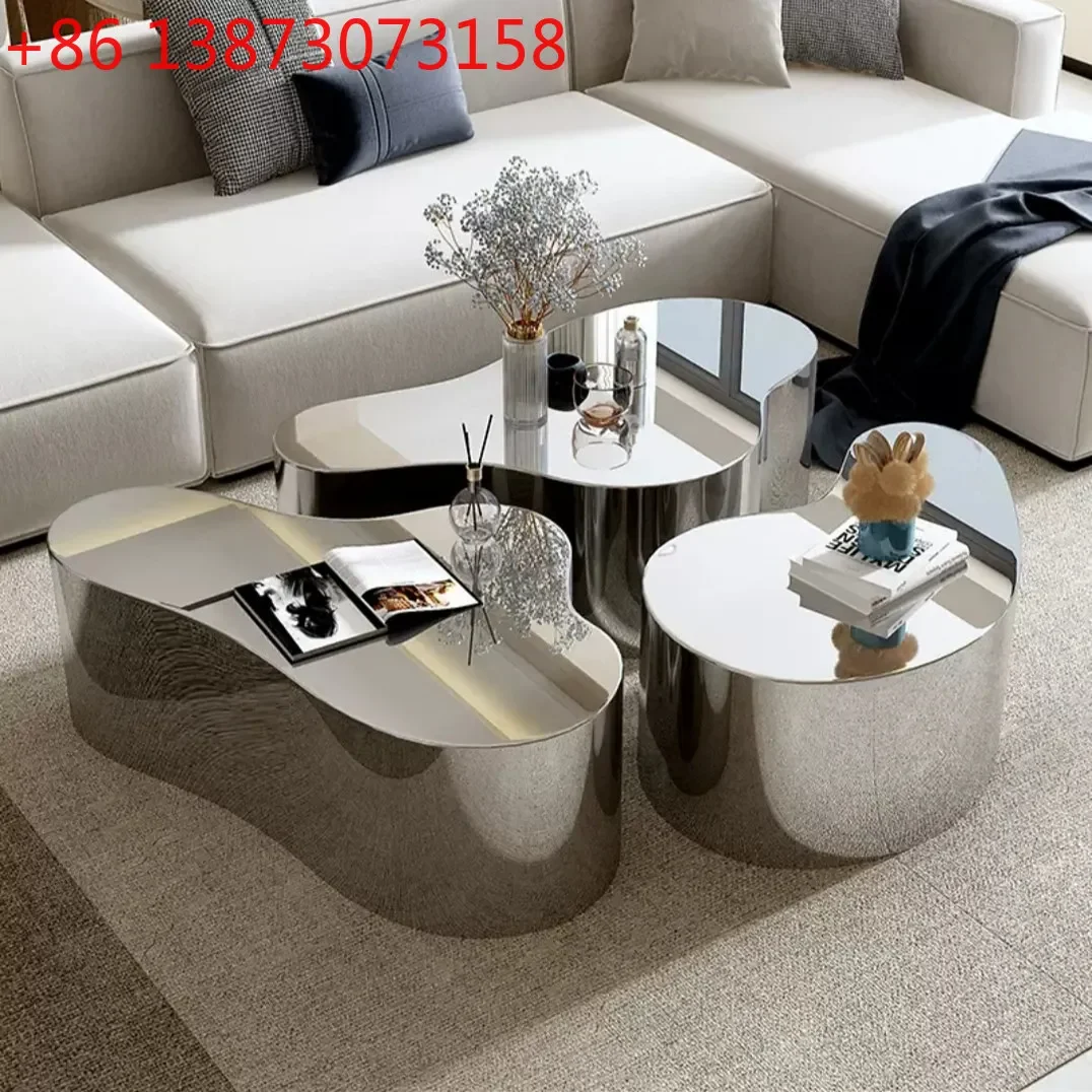 Minimalist light luxury stainless steel coffee table Simple Nakajima water table Creative special-shaped display table Living
Minimalist light luxury stainless steel coffee table Simple Nakajima water table Creative special-shaped display table Living