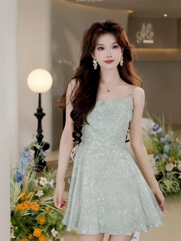 Gentle Wind Sequin Strap Dress Women's Summer New Style Elegant Waist Cinching Slimming Beautiful A-Line Short Skirt
Gentle Wind Sequin Strap Dress Women's Summer New Style Elegant Waist Cinching Slimming Beautiful A-Line Short Skirt