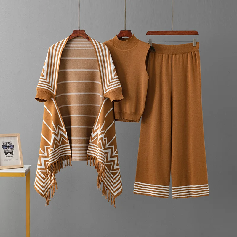 European and American women's striped sweater tassel shawl jacket+simple vest+knitted wide leg pants three piece set
European and American women's striped sweater tassel shawl jacket+simple vest+knitted wide leg pants three piece set