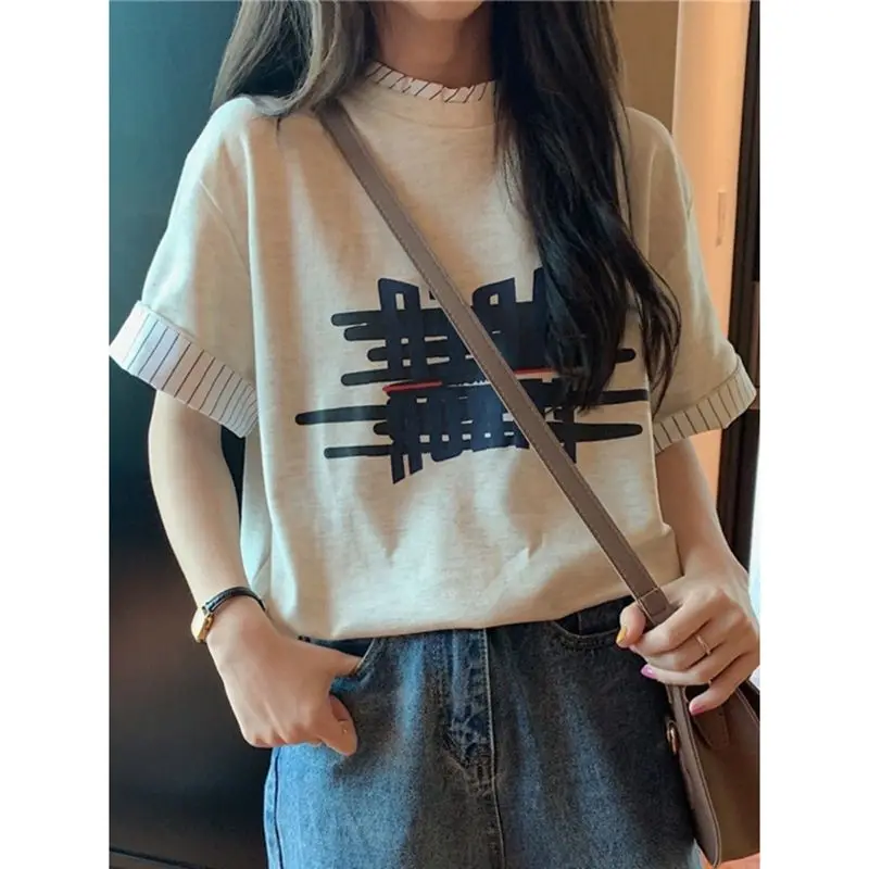 Hong Kong style retro fake two-piece short-sleeved T-shirt for women summer loose printed American top trend women clothing y2k
Hong Kong style retro fake two-piece short-sleeved T-shirt for women summer loose printed American top trend women clothing y2k