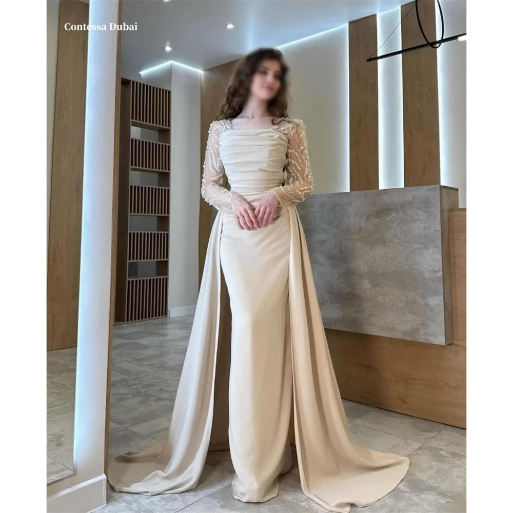 Contessa Dubai Белое платье русалки с пайетками для выпускного вечера с длинным шлейфом по индивидуальному заказу فساتين заслуживающим длинным шлейфом платье de gala noche mujer
Contessa Dubai Белое платье русалки с пайетками для выпускного вечера с длинным шлейфом по индивидуальному заказу فساتين заслуживающим длинным шлейфом платье de gala noche mujer