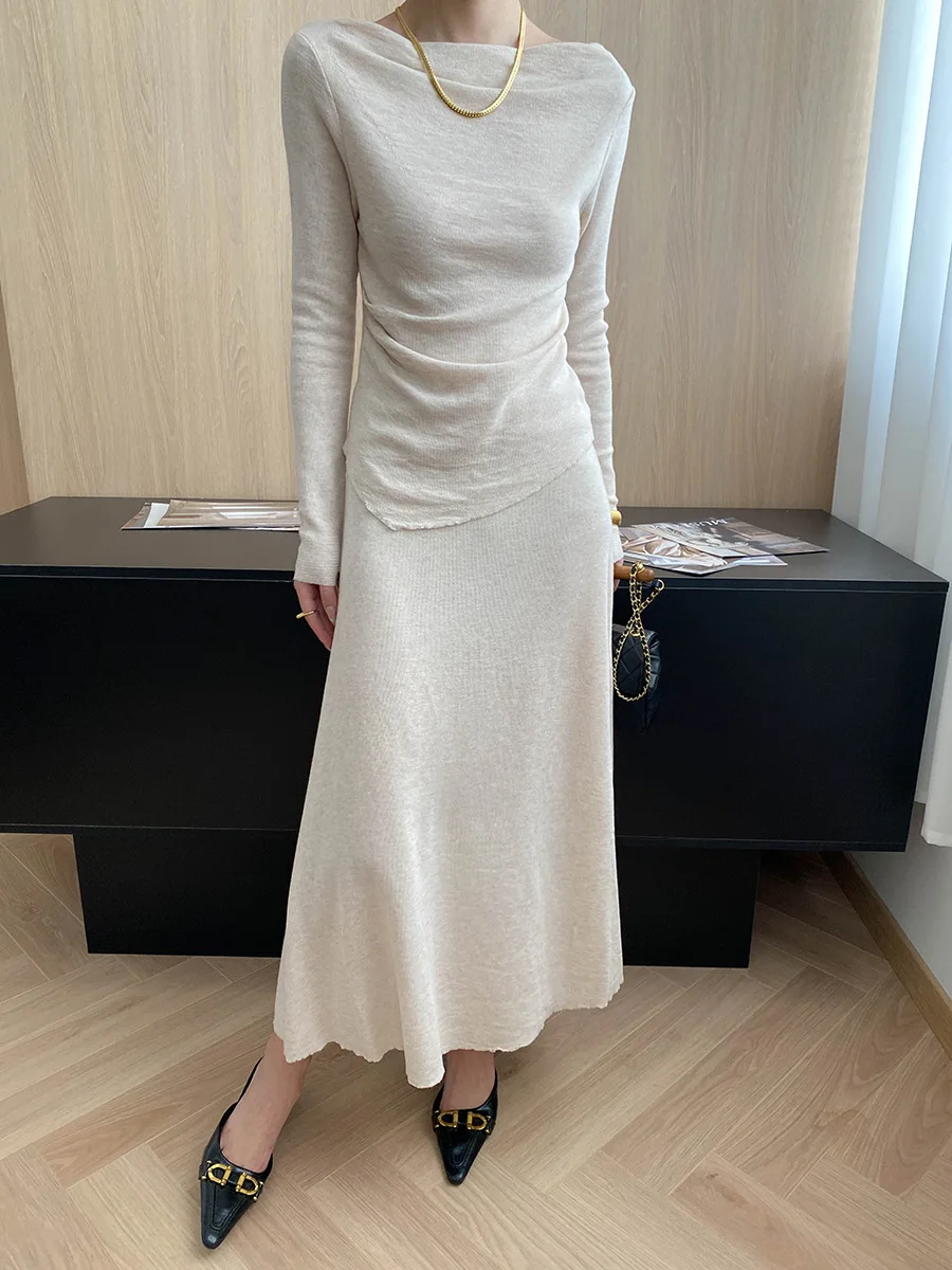 Early Autumn New French Gentle Style Irregular Swinging Neck Knitted Shirt Half Skirt Two Piece Set
Early Autumn New French Gentle Style Irregular Swinging Neck Knitted Shirt Half Skirt Two Piece Set