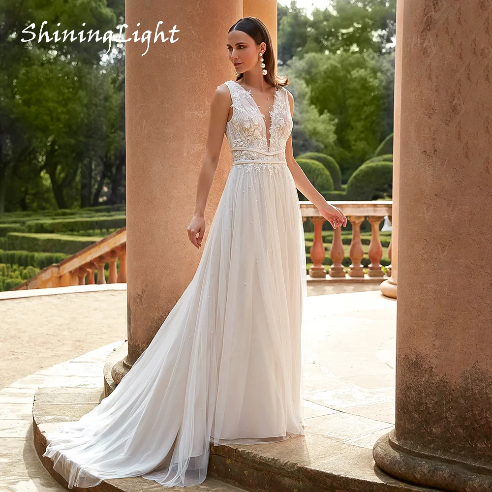 ShiningLight Vintage Boho Wedding Dresses For Women V Neck Sleeveless Beach Bridal Gowns Appliques Robe Mariée Customized
ShiningLight Vintage Boho Wedding Dresses For Women V Neck Sleeveless Beach Bridal Gowns Appliques Robe Mariée Customized