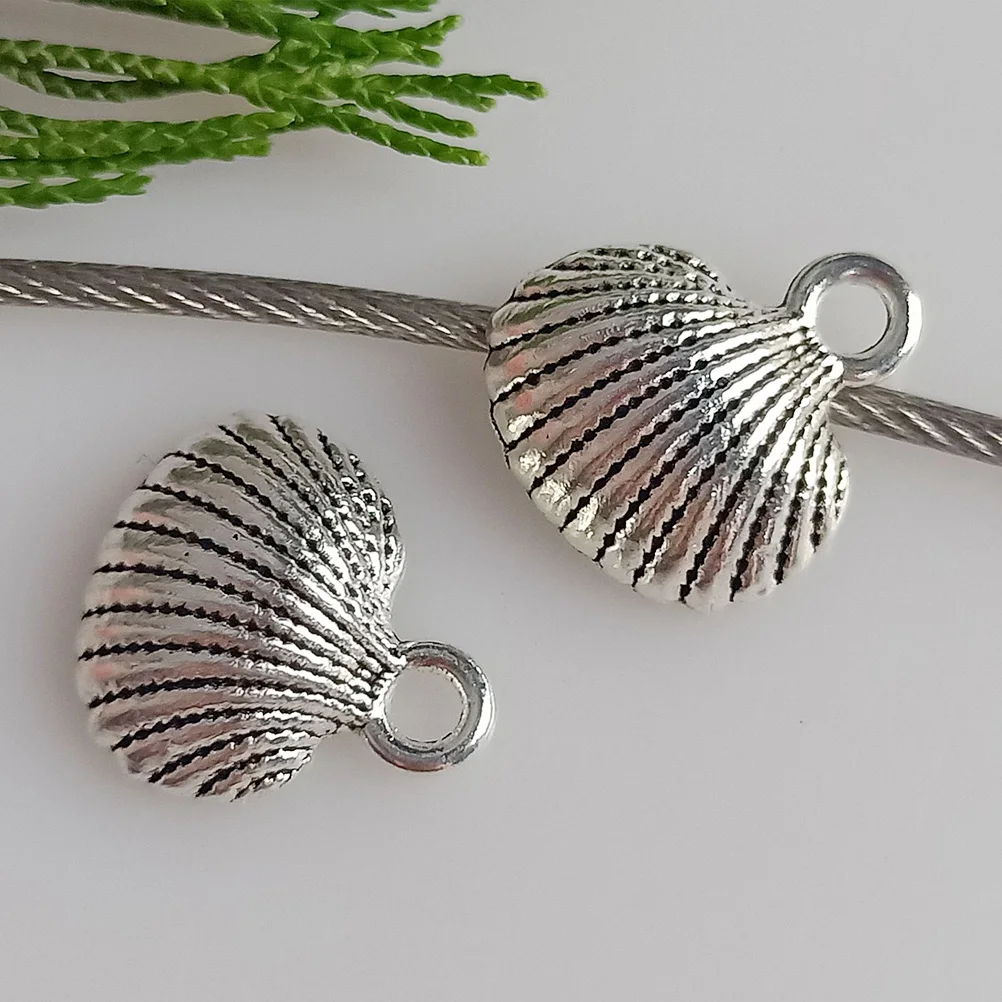 100 Pcs Shell Scallop Pendant Alloy Charms Vintage Accessories Silver DIY Craft Retro naments Jewelry Making Gifts
100 Pcs Shell Scallop Pendant Alloy Charms Vintage Accessories Silver DIY Craft Retro naments Jewelry Making Gifts