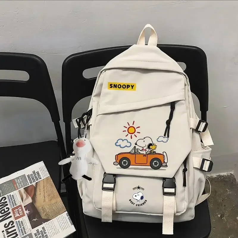Snoopy новая нейлоновая школьная сумка, студенческая сумка с сумкой-подвеской, модный рюкзак для мальчиков и девочек
Snoopy новая нейлоновая школьная сумка, студенческая сумка с сумкой-подвеской, модный рюкзак для мальчиков и девочек