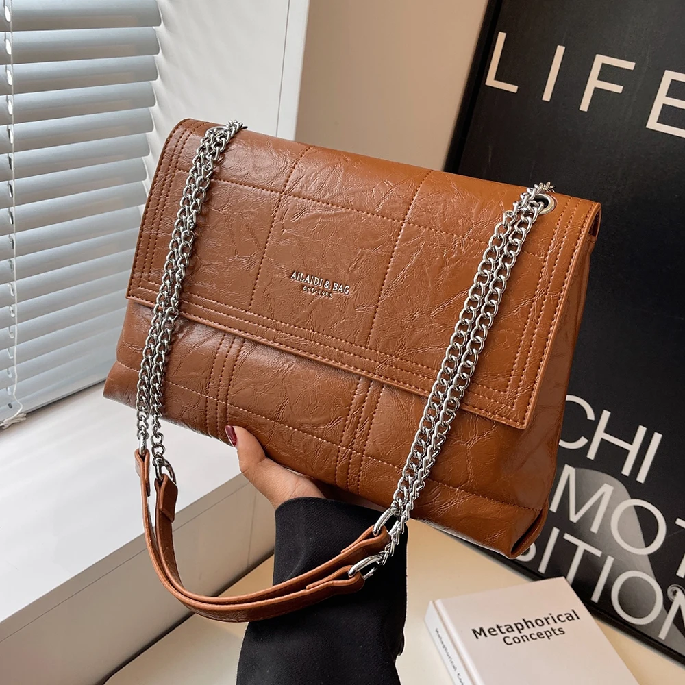 Women Vintage Chains Shoulder Bags Elegant Ladies Underarm Handbags Simple Solid Color Large Capacity Crossbody Bag High Quality
Women Vintage Chains Shoulder Bags Elegant Ladies Underarm Handbags Simple Solid Color Large Capacity Crossbody Bag High Quality