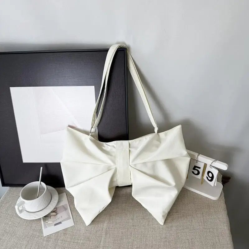 New Retro polka dot bow bag Large capacity commuter tote bag crossbody bag Fashion underarm pouch Bow design Underarm Handbag
New Retro polka dot bow bag Large capacity commuter tote bag crossbody bag Fashion underarm pouch Bow design Underarm Handbag