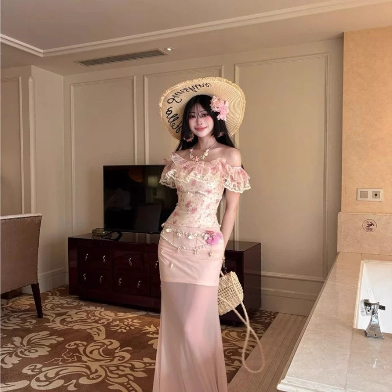 2026 Summer Fashion Sweet Girl Ruffle Floral One Shoulder Top with Half Body Slimming Mesh Skirt
2026 Summer Fashion Sweet Girl Ruffle Floral One Shoulder Top with Half Body Slimming Mesh Skirt