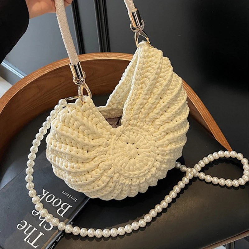 Luxury Hand-woven Shell Bag Women Seaside Conch Shell Messenger Shoulder Bag Exquisite Pearl Chain Fashion Holiday Shopping Bag
Luxury Hand-woven Shell Bag Women Seaside Conch Shell Messenger Shoulder Bag Exquisite Pearl Chain Fashion Holiday Shopping Bag