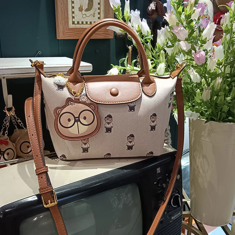 Cream Bear Original Genuine New Dumpling Bag 2025 Casual Bear Pendant Versatile One Shoulder Crossbody Small Bag Tide Handbag
Cream Bear Original Genuine New Dumpling Bag 2025 Casual Bear Pendant Versatile One Shoulder Crossbody Small Bag Tide Handbag