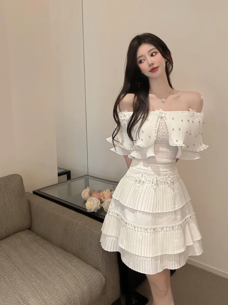 Women Short Ruffles Elasticity Top +High Waist Mini Pleated Skirt Suit 2025 Summer High Quality Pearl Chiffon 2 Piece Suit
Women Short Ruffles Elasticity Top +High Waist Mini Pleated Skirt Suit 2025 Summer High Quality Pearl Chiffon 2 Piece Suit