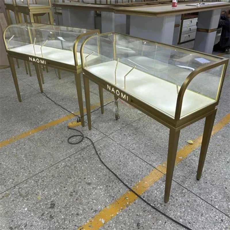 custom.Curved Glass Display Metal Jewelry showcase Gold Stainless Steel LED Custom Luxury Retail OEM Direct
custom.Curved Glass Display Metal Jewelry showcase Gold Stainless Steel LED Custom Luxury Retail OEM Direct
