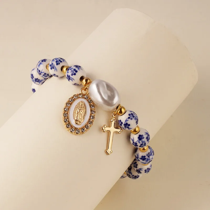 Cross blue and white ceramic bracelets for men and women, stylish irregular baroque pearls for women jewelry accessories
Cross blue and white ceramic bracelets for men and women, stylish irregular baroque pearls for women jewelry accessories