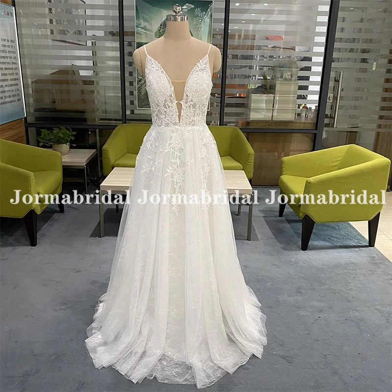 Sparkly Lace Boho Wedding Dresses Full Length Spaghetti Strap Illusion V-neck Glitter Tulle Beach Bridal Dress Suknia ślubna
Sparkly Lace Boho Wedding Dresses Full Length Spaghetti Strap Illusion V-neck Glitter Tulle Beach Bridal Dress Suknia ślubna
