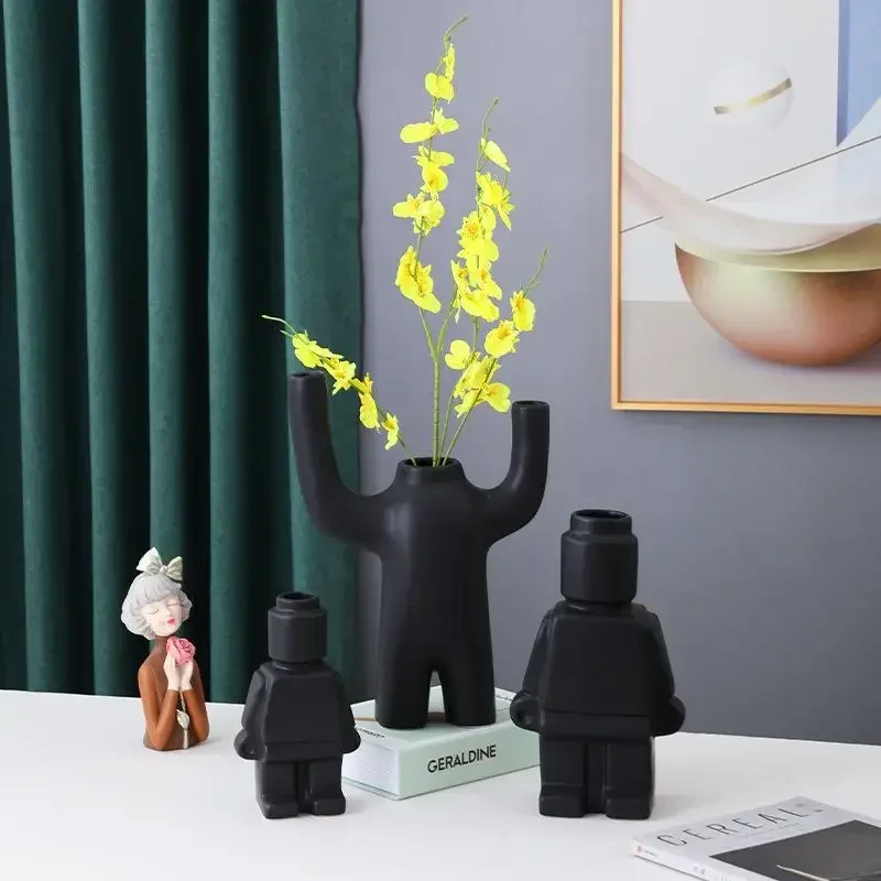 Nordic style ceramic robot vase indoor flower pot modern home interior decoration white goods decoration office desk decoration
Nordic style ceramic robot vase indoor flower pot modern home interior decoration white goods decoration office desk decoration