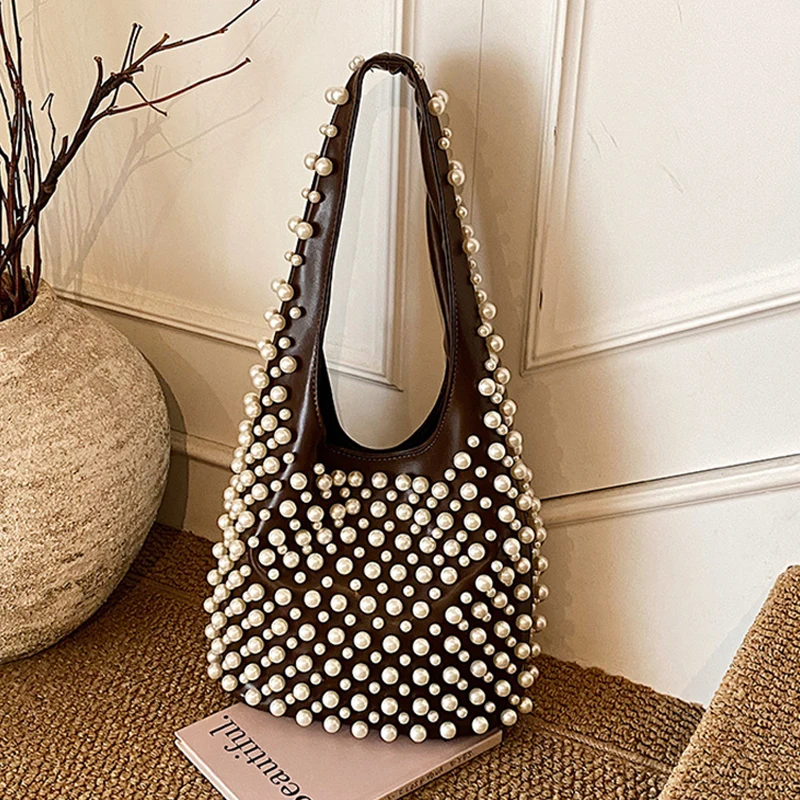 Personalized Pearl Banquet Bag Elegant Party One Shoulder Underarm Bucket Bag European American Large Capacity Commuter Handbags
Personalized Pearl Banquet Bag Elegant Party One Shoulder Underarm Bucket Bag European American Large Capacity Commuter Handbags