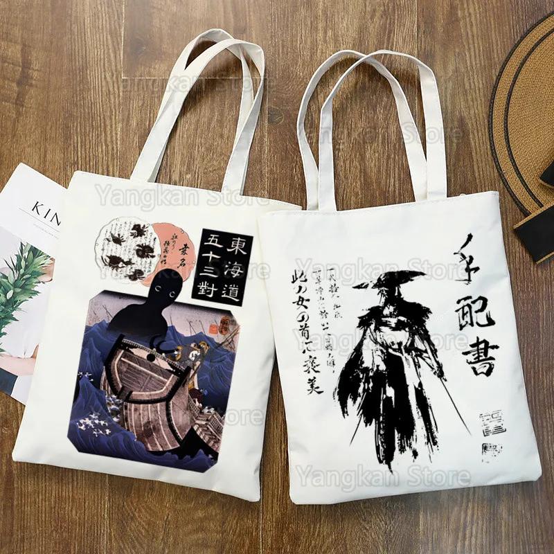 Ghost of Yotei Сумка для покупок Сумки-шопперы Tote Холст Harajuku Многоразовая большая вместительная повседневная сумка на плечо Сумка
Ghost of Yotei Сумка для покупок Сумки-шопперы Tote Холст Harajuku Многоразовая большая вместительная повседневная сумка на плечо Сумка