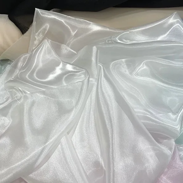 Solid-color sequin organza water-gloss semi-transparent fabric for high-end clothing sewing DIY background decoration fabric
Solid-color sequin organza water-gloss semi-transparent fabric for high-end clothing sewing DIY background decoration fabric