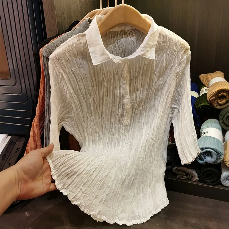 Miyake плиссированная футболка с французским воротником-поло, плиссированная блузка с короткими рукавами, женская 2022, весна-лето, зарубежная однотонная тонкая футболка для женщин
Miyake плиссированная футболка с французским воротником-поло, плиссированная блузка с короткими рукавами, женская 2022, весна-лето, зарубежная однотонная тонкая футболка для женщин