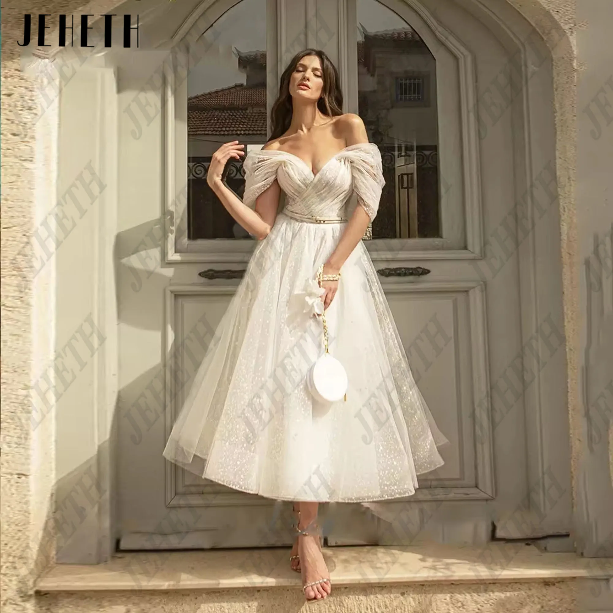 JEHETH Bling Glittter Boho Wedding Dresses For Women Off Shoulder Sweetheaart Net Tulle Beach Tea Length Lace Up Customized
JEHETH Bling Glittter Boho Wedding Dresses For Women Off Shoulder Sweetheaart Net Tulle Beach Tea Length Lace Up Customized