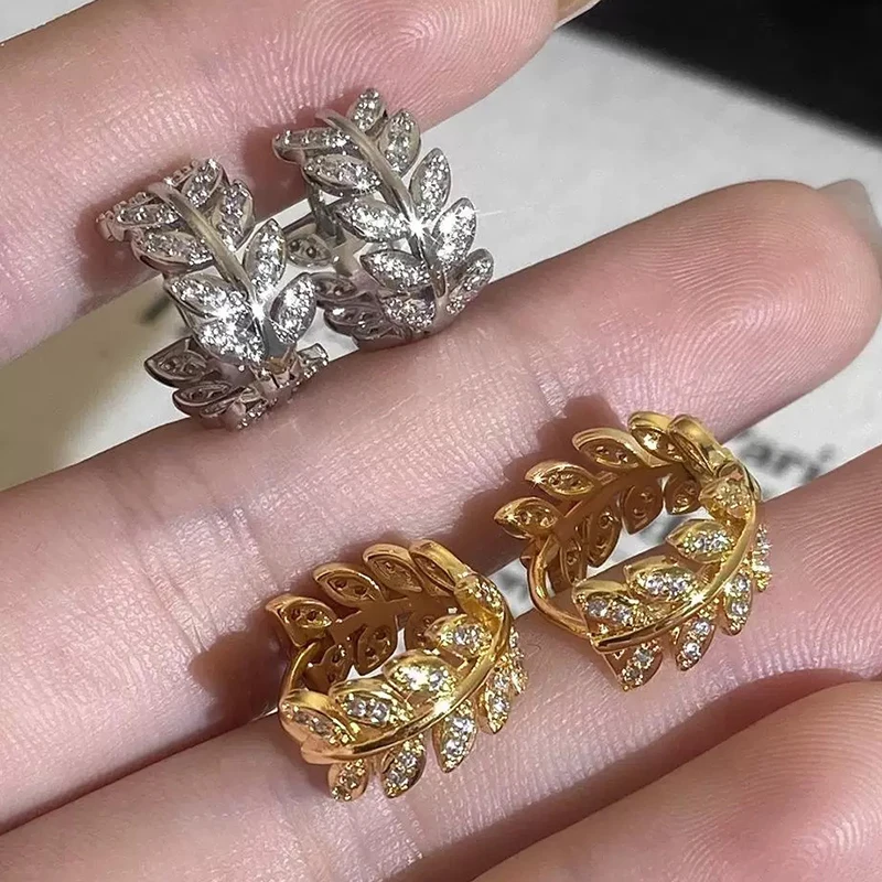 PONYKISS 925 Sterling Silver 18K Gold Zircon Leaves Hoop Earrings for Women Trendy Plant Fine Jewelry Minimalist Accessories
PONYKISS 925 Sterling Silver 18K Gold Zircon Leaves Hoop Earrings for Women Trendy Plant Fine Jewelry Minimalist Accessories