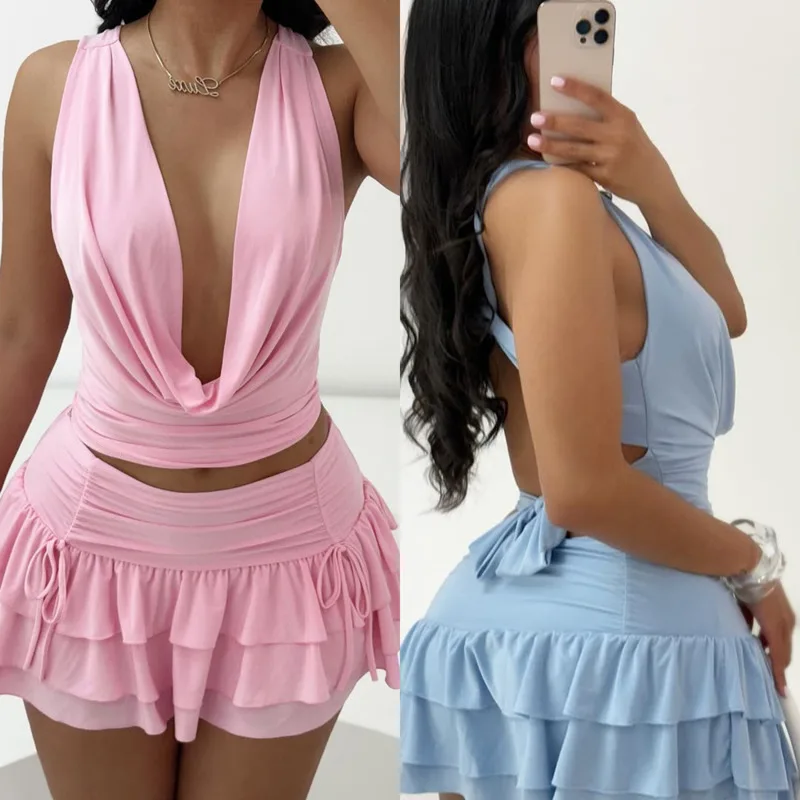 Sexy Hollowed Out Crop Top With A Dangling Collar And Straps Tied Lace-up Pleated Cake-style Elastic Mini Skirt Trendy Women Set
Sexy Hollowed Out Crop Top With A Dangling Collar And Straps Tied Lace-up Pleated Cake-style Elastic Mini Skirt Trendy Women Set