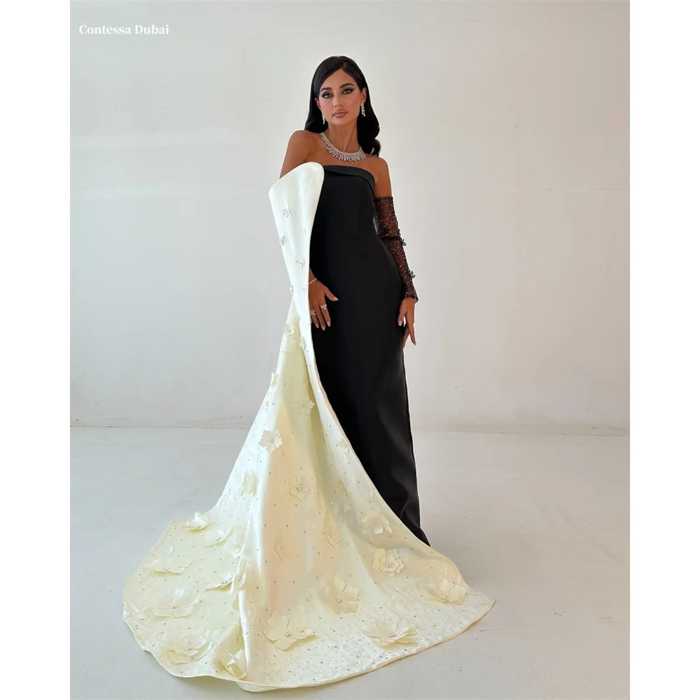 Contessa Dubai Black 3D Flowers Off Shoulder Prom Dresses symmetrical Customized فساتين سهرات Court Train robes de soirée
Contessa Dubai Black 3D Flowers Off Shoulder Prom Dresses symmetrical Customized فساتين سهرات Court Train robes de soirée