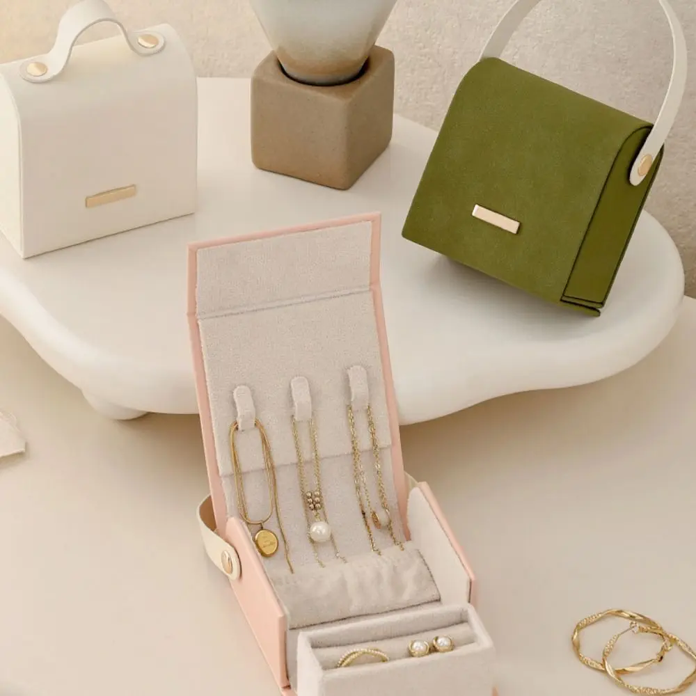 Hand-Held Jewelry Packing Bag PU Leather Rings Necklace Earrings Storage Case Handbag Appearance Large Capacity
Hand-Held Jewelry Packing Bag PU Leather Rings Necklace Earrings Storage Case Handbag Appearance Large Capacity