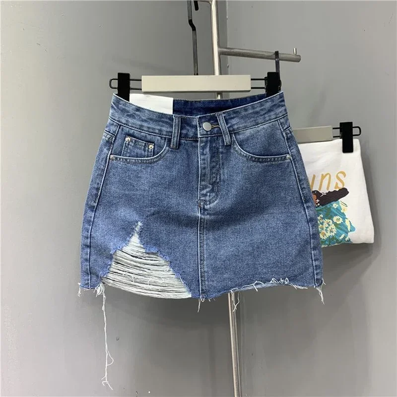 Washed and Worn Out Irregular Denim Half Body Skirts.New Summer Fashion and Individual High-waisted Denim Short Skirt for Women
Washed and Worn Out Irregular Denim Half Body Skirts.New Summer Fashion and Individual High-waisted Denim Short Skirt for Women