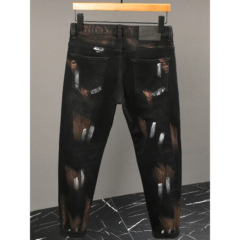 High end nostalgic jeans men's street handsome design, paint graffiti printing, elastic retro pants
High end nostalgic jeans men's street handsome design, paint graffiti printing, elastic retro pants