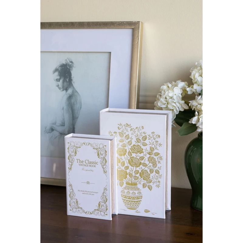 Set of 2 Decorative Book Boxes with White and Gold Floral Motifs and Text, L: 7x3x10.5 S: 5x2x8.3
Set of 2 Decorative Book Boxes with White and Gold Floral Motifs and Text, L: 7x3x10.5 S: 5x2x8.3