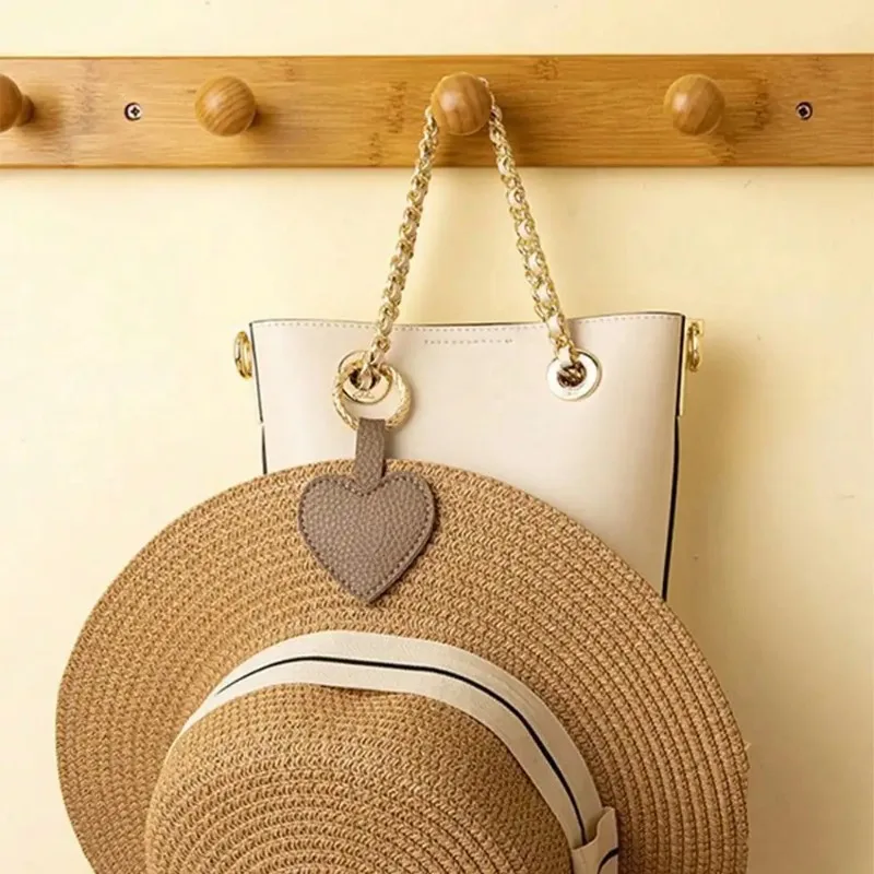 Travel Bag Hat Clip Kawaii Heart-shaped PU Leather Hat Hanger Outdoor Travel Beach Hat Clamps Travel Accessories Luggage Tags
Travel Bag Hat Clip Kawaii Heart-shaped PU Leather Hat Hanger Outdoor Travel Beach Hat Clamps Travel Accessories Luggage Tags