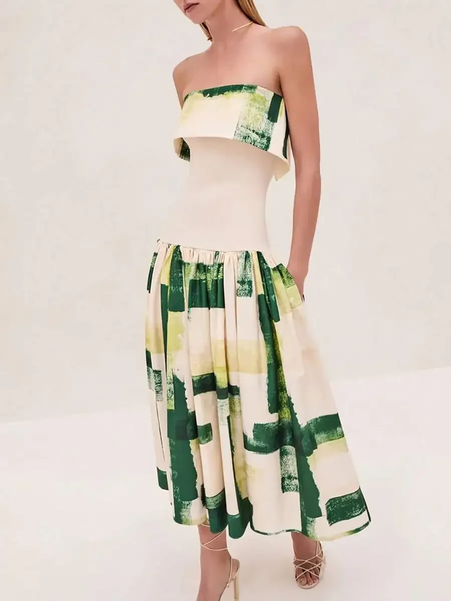 Cream And Green Abstract Watercolor Strapless Midi Dress With Fitted Corset Top And Voluminous Pleated A-Line Skirt
Cream And Green Abstract Watercolor Strapless Midi Dress With Fitted Corset Top And Voluminous Pleated A-Line Skirt