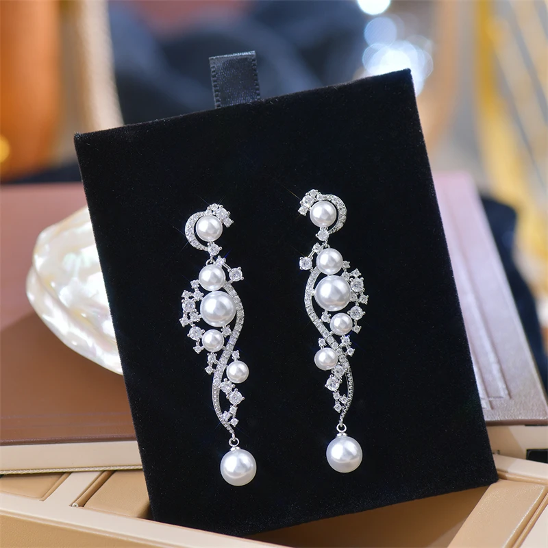 Fashion Luxury Imitation Pearl Crystal Earrings for Women Korean Exquisite Long Pendant Earrings Jewelry Accessories Gifts
Fashion Luxury Imitation Pearl Crystal Earrings for Women Korean Exquisite Long Pendant Earrings Jewelry Accessories Gifts