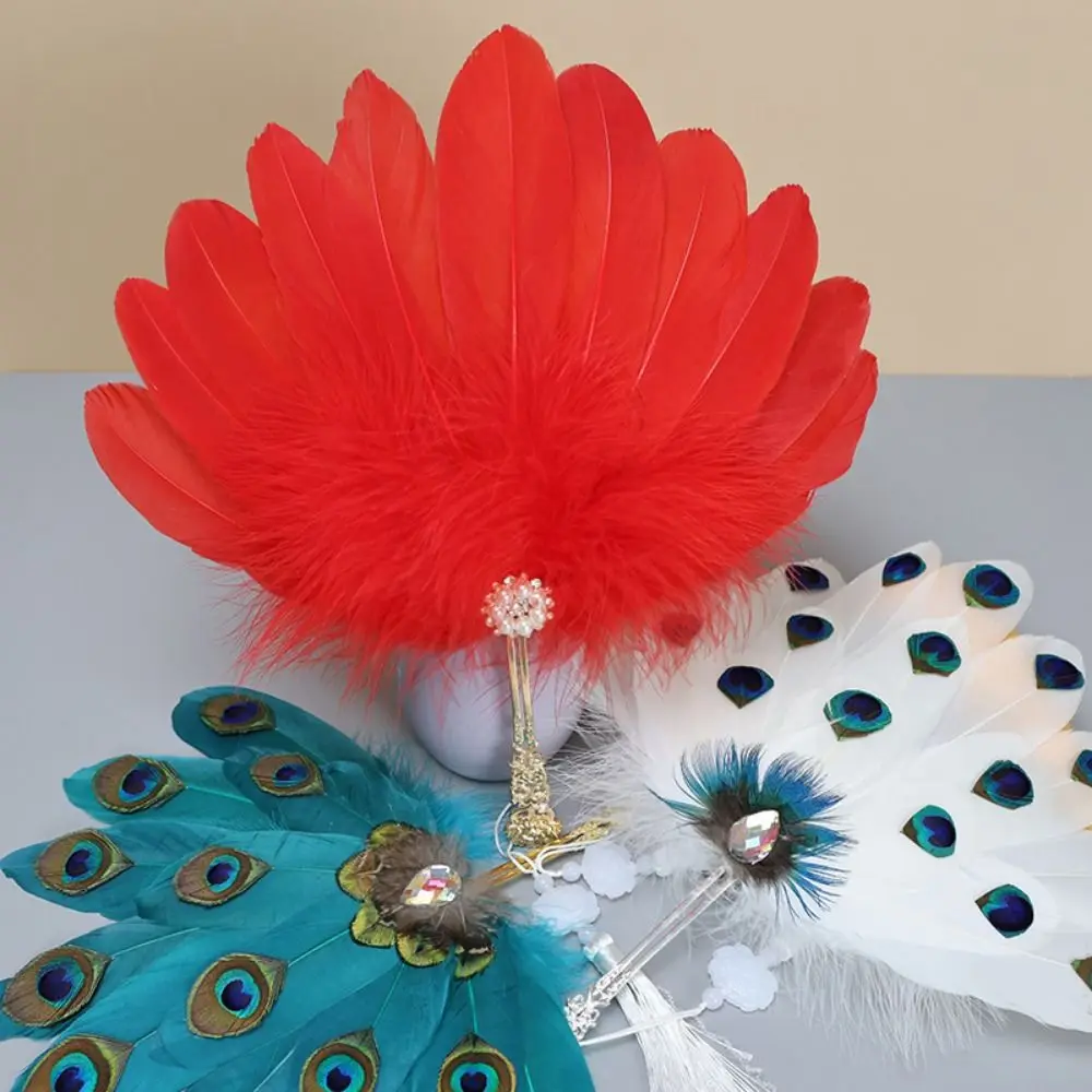 Exquisite Pearl Feather Fan Creative Cosplay Peacock Feather Fan Costume Dancing Show Portable Decorative Craft Fan
Exquisite Pearl Feather Fan Creative Cosplay Peacock Feather Fan Costume Dancing Show Portable Decorative Craft Fan
