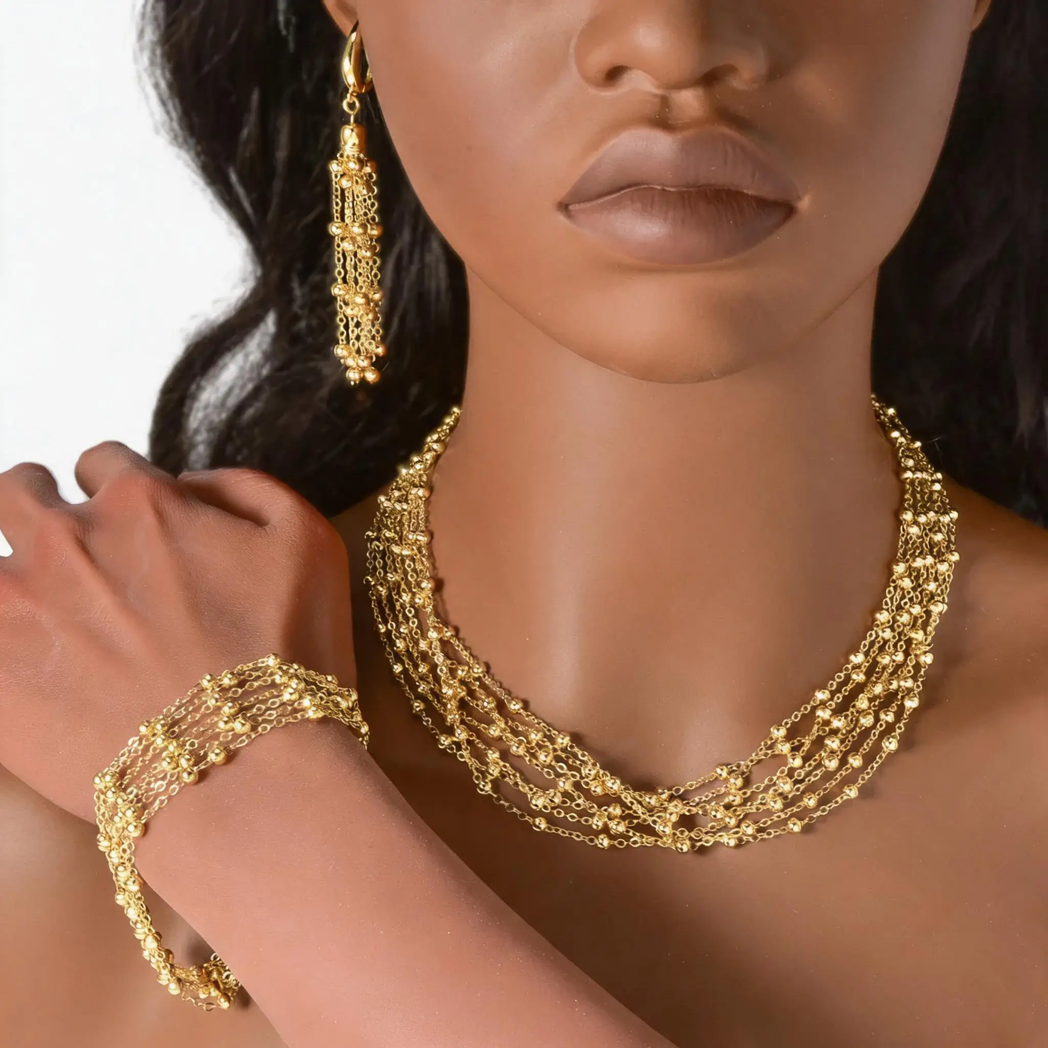 Dubai Gold Beaded Chain Necklace Set with Lockbone & Tassel Pendant, Long Layered Jewelry
Dubai Gold Beaded Chain Necklace Set with Lockbone & Tassel Pendant, Long Layered Jewelry