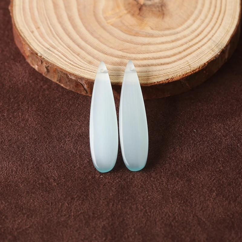 B & F синие бусины-каплевидные драгоценные камни Cymophane 41x10x5 мм 6,3 г для изготовления ювелирных изделий своими руками, серьги
B & F синие бусины-каплевидные драгоценные камни Cymophane 41x10x5 мм 6,3 г для изготовления ювелирных изделий своими руками, серьги