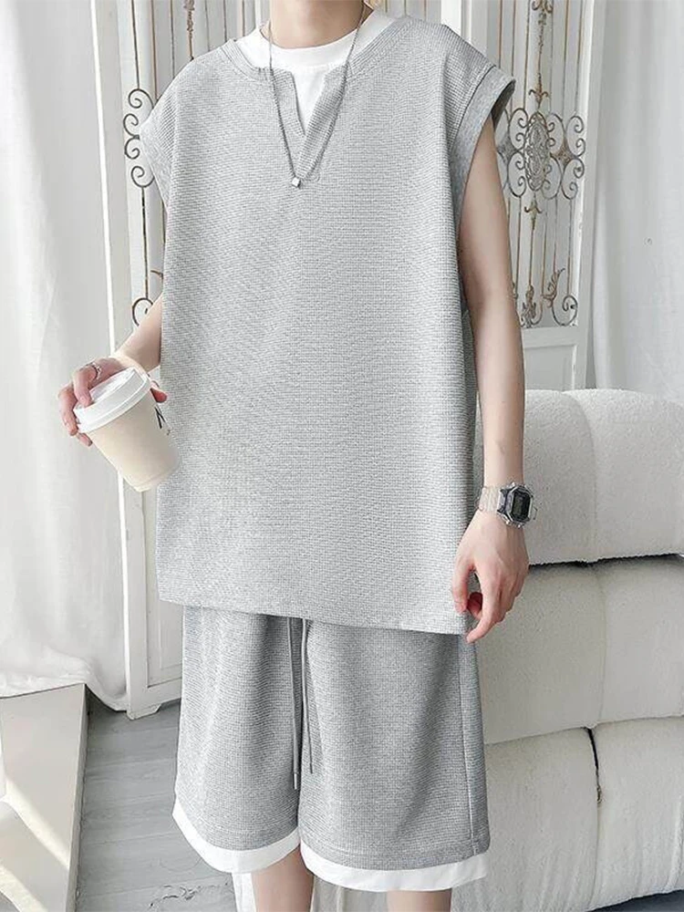 Men's Summer Breathable Thin Sleeveless Tank Top And Shorts Set Five-Quarter Polyester Fiber Casual Sportswear Ensemble
Men's Summer Breathable Thin Sleeveless Tank Top And Shorts Set Five-Quarter Polyester Fiber Casual Sportswear Ensemble