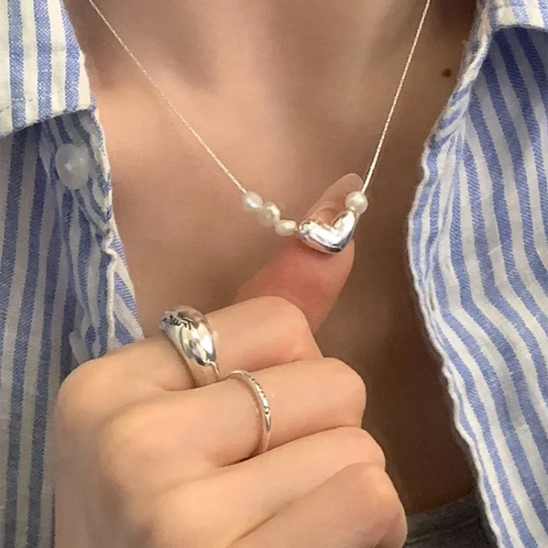 PANJBJ 925 Silver Love Heart Pearl Necklace for Women Gift Korean Versatile Simplicity Irregular Jewelry Dropshipping
PANJBJ 925 Silver Love Heart Pearl Necklace for Women Gift Korean Versatile Simplicity Irregular Jewelry Dropshipping