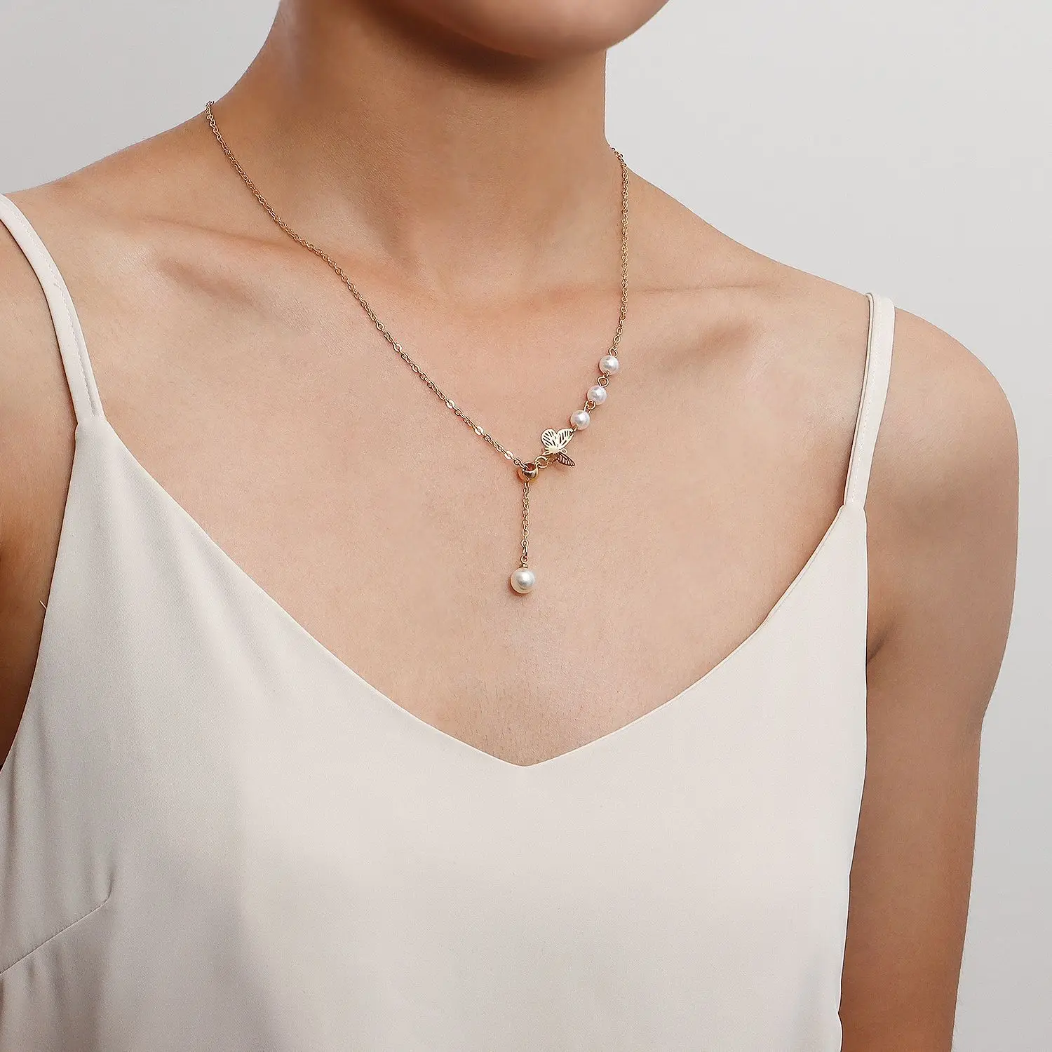 Delicate butterfly pearl fringed necklace female ins light luxury high-end clavicle chain simple master design choker
Delicate butterfly pearl fringed necklace female ins light luxury high-end clavicle chain simple master design choker