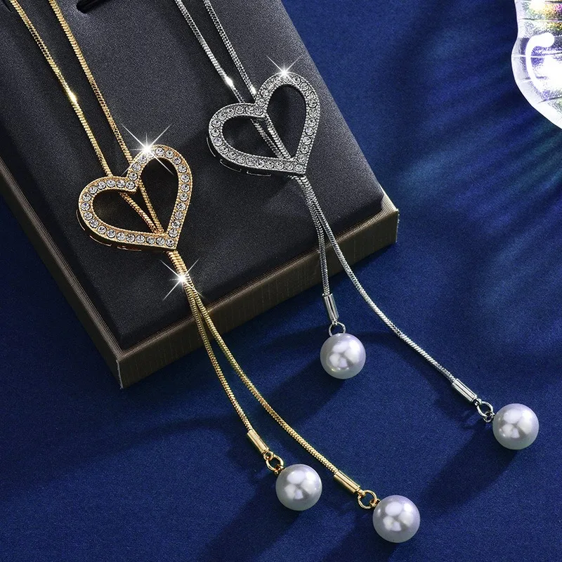 Long, versatile, high-end and elegant necklaces and clothing chains, heart-shaped tassel ladies pull out sweater chains
Long, versatile, high-end and elegant necklaces and clothing chains, heart-shaped tassel ladies pull out sweater chains